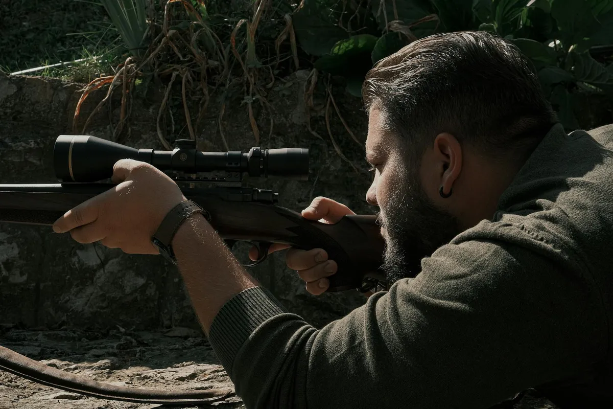 A precision rifle scope mounted on a rifle